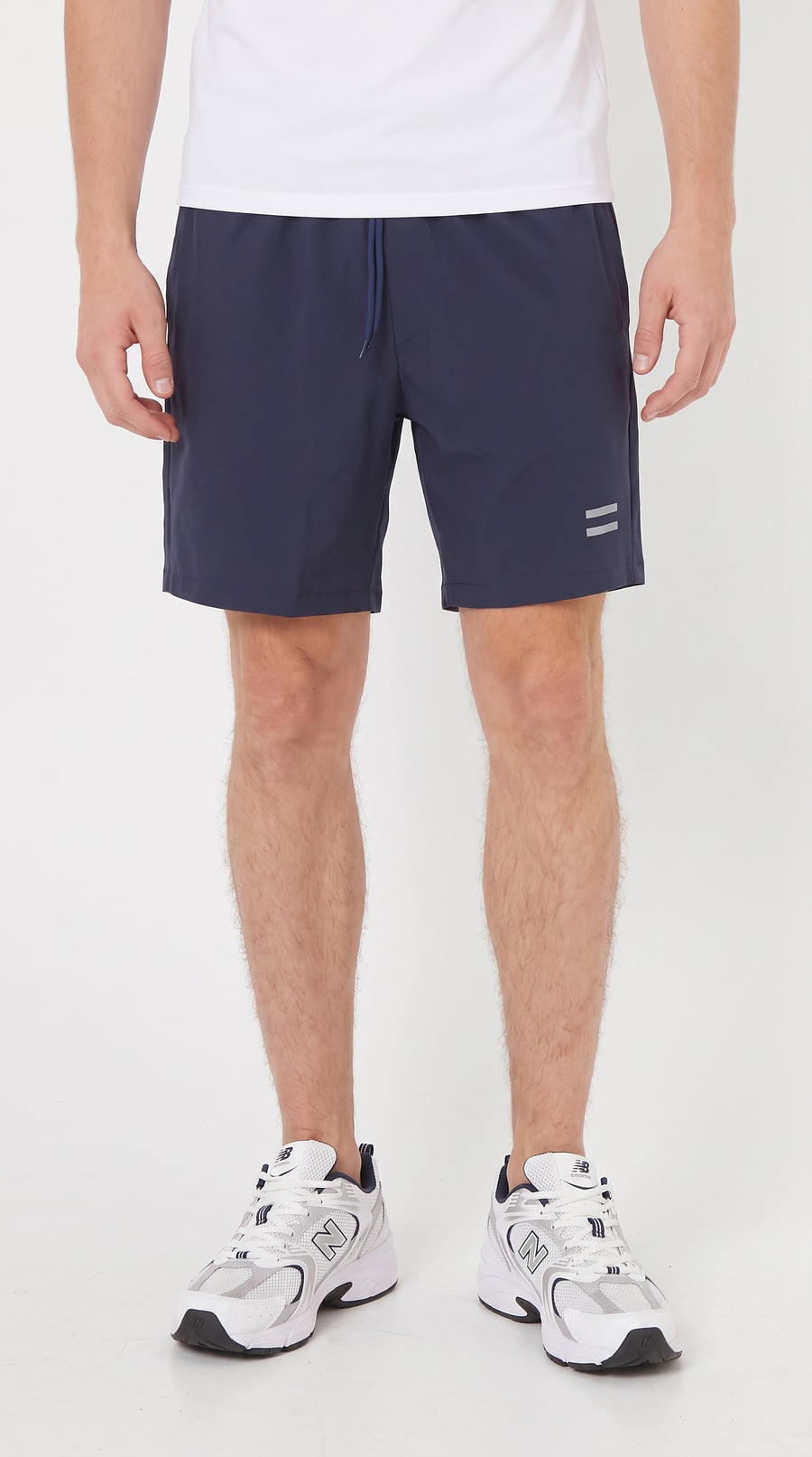 Pantaloneta deportiva azul oscuro con reflectivo para hombre – Belife