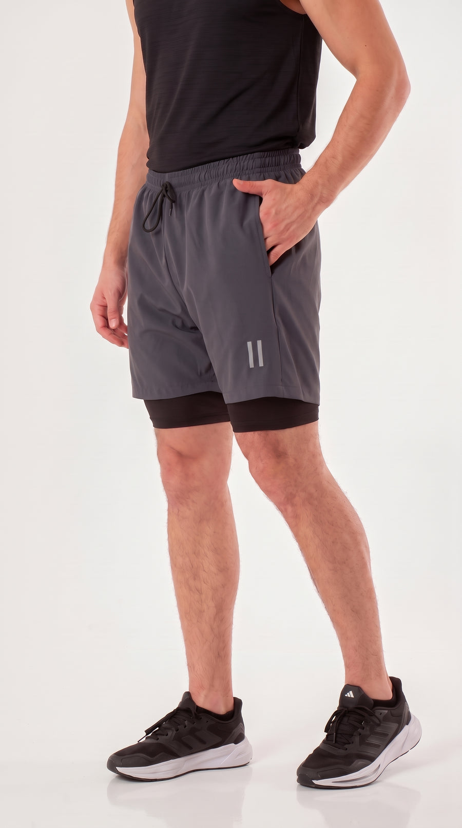 Pantaloneta deportiva gris con ciclista para hombre