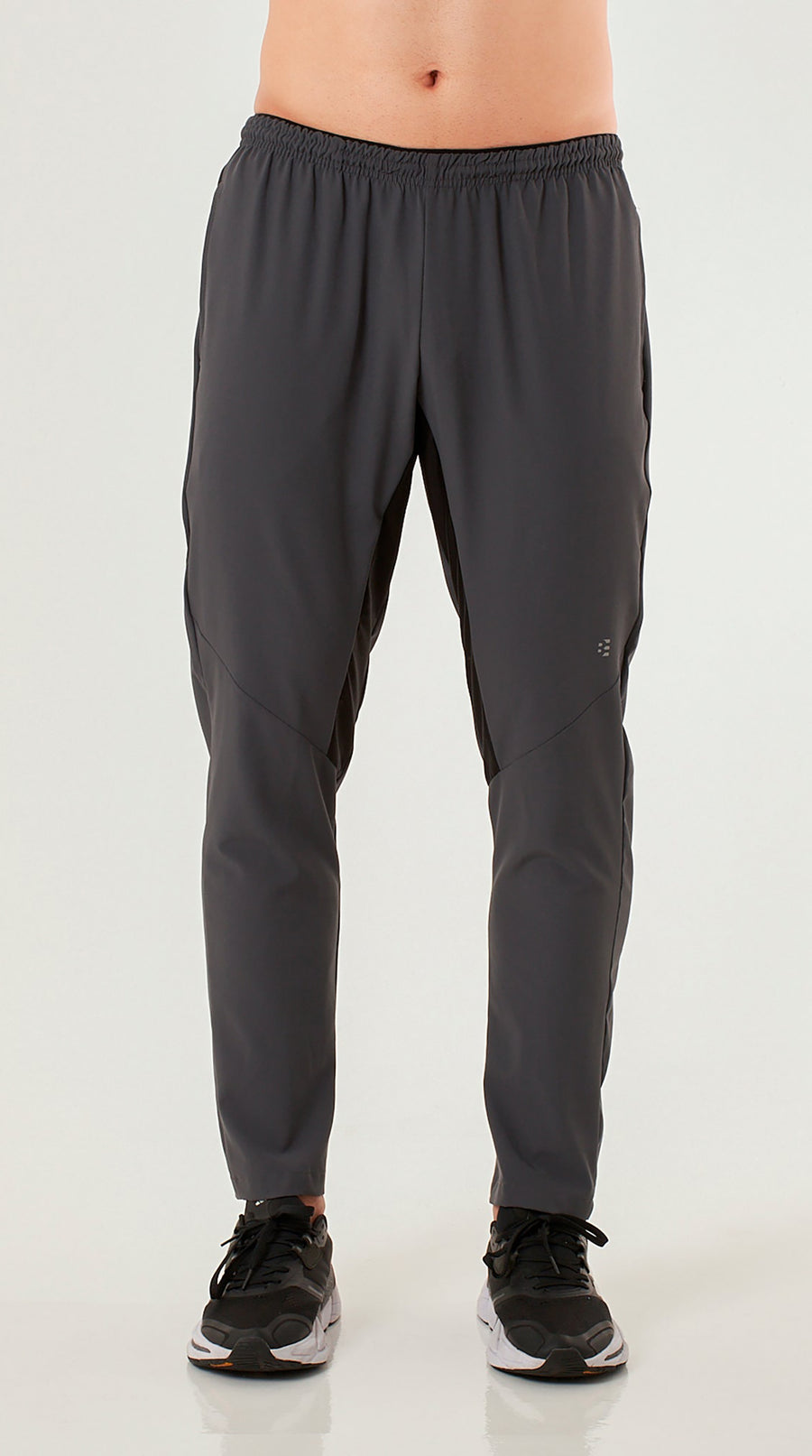 Pantalón deportivo gris con malla para hombre