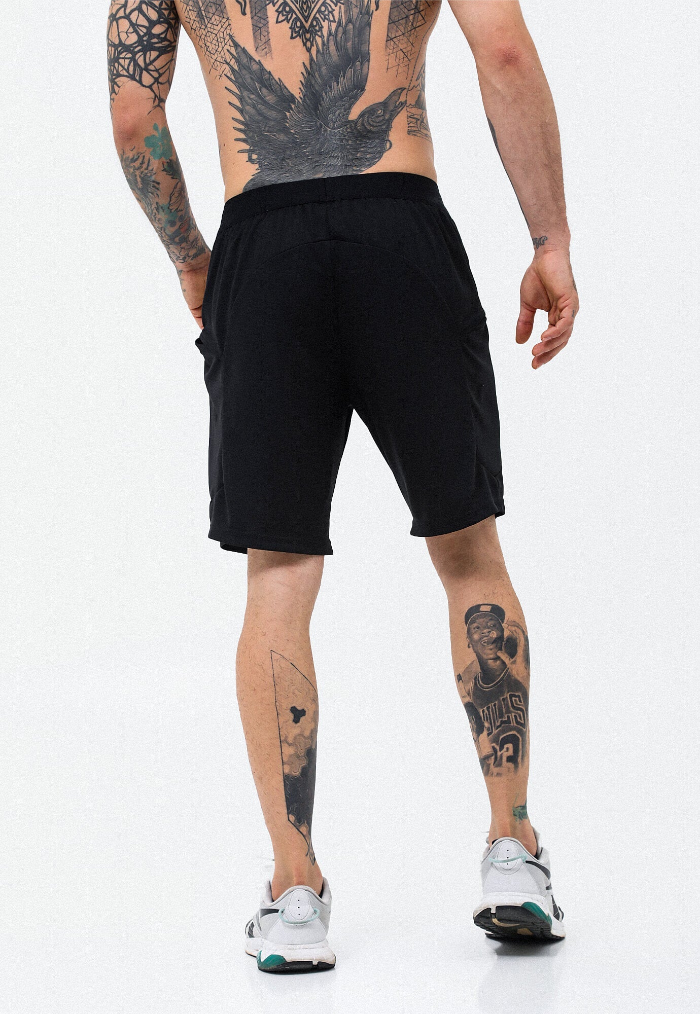 Pantaloneta deportiva negra con cotilla north y elástico expuesto para hombre