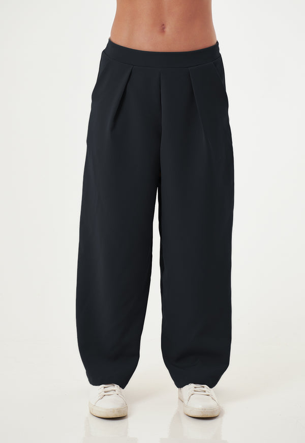 Pantalón amplio negro con prenses para mujer
