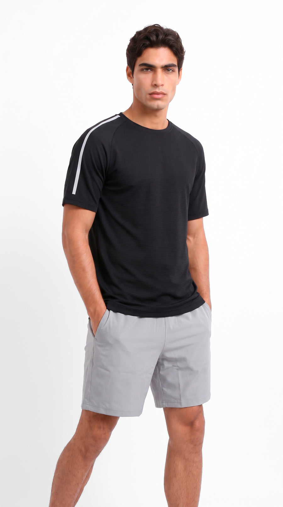 Camiseta deportiva negra manga raglán para hombre
