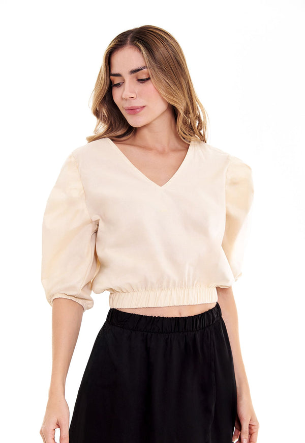 Blusa con manga bombacha