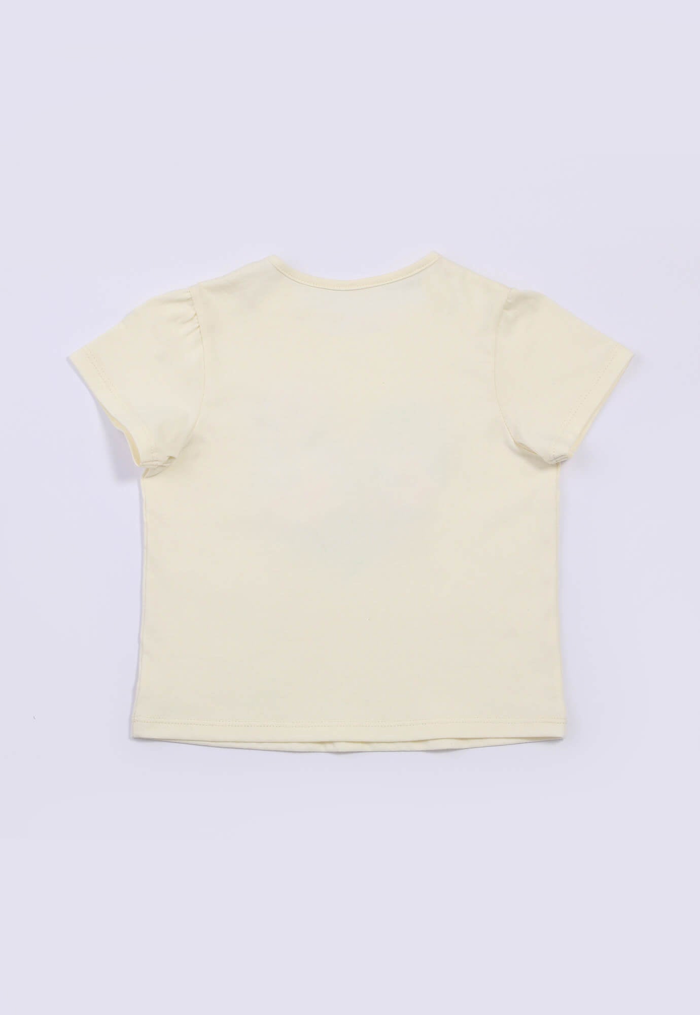 Camiseta ivory estampada y con apliques frontales y manga recogida para bebé niña