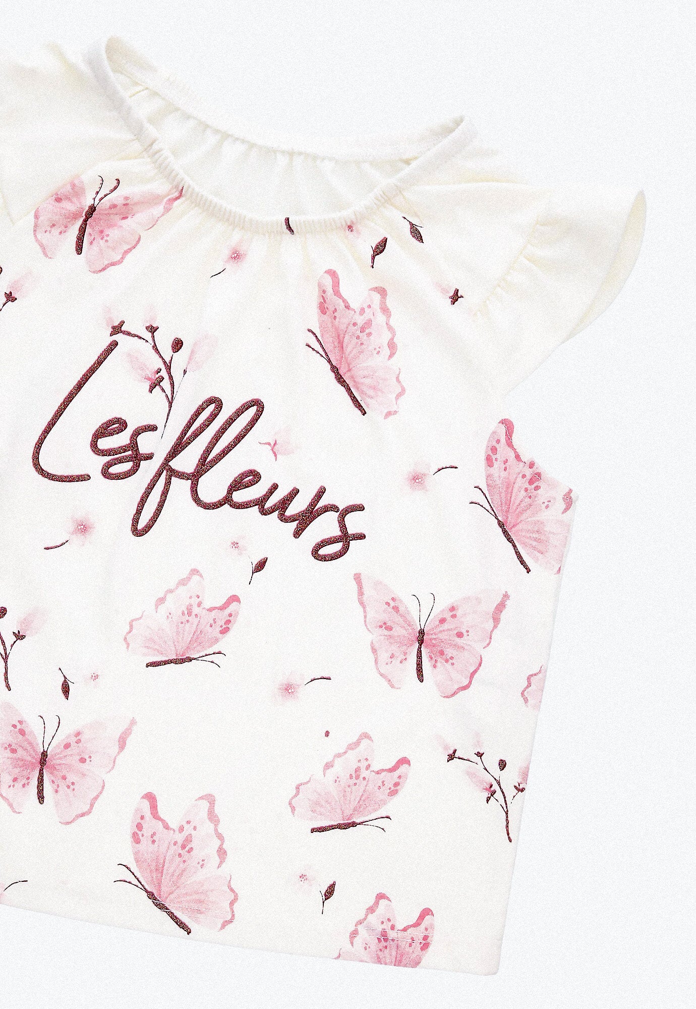 Conjunto corto, camiseta ivory en rib, sublimada y short rosa con cintura elástica para bebé niña
