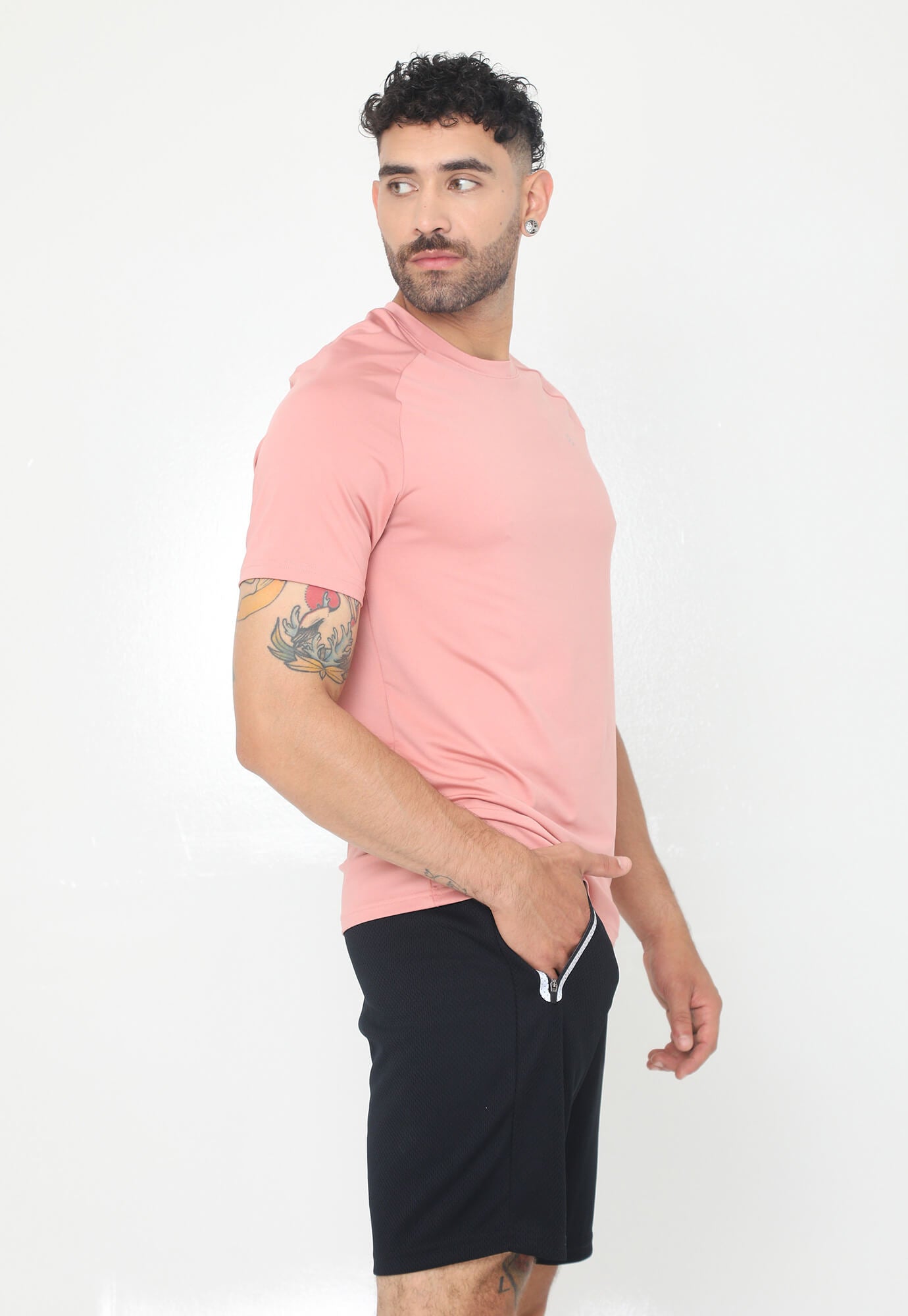 Camiseta deportiva rosa manga corta silueta semi-ajustada con cuello redondo para hombre