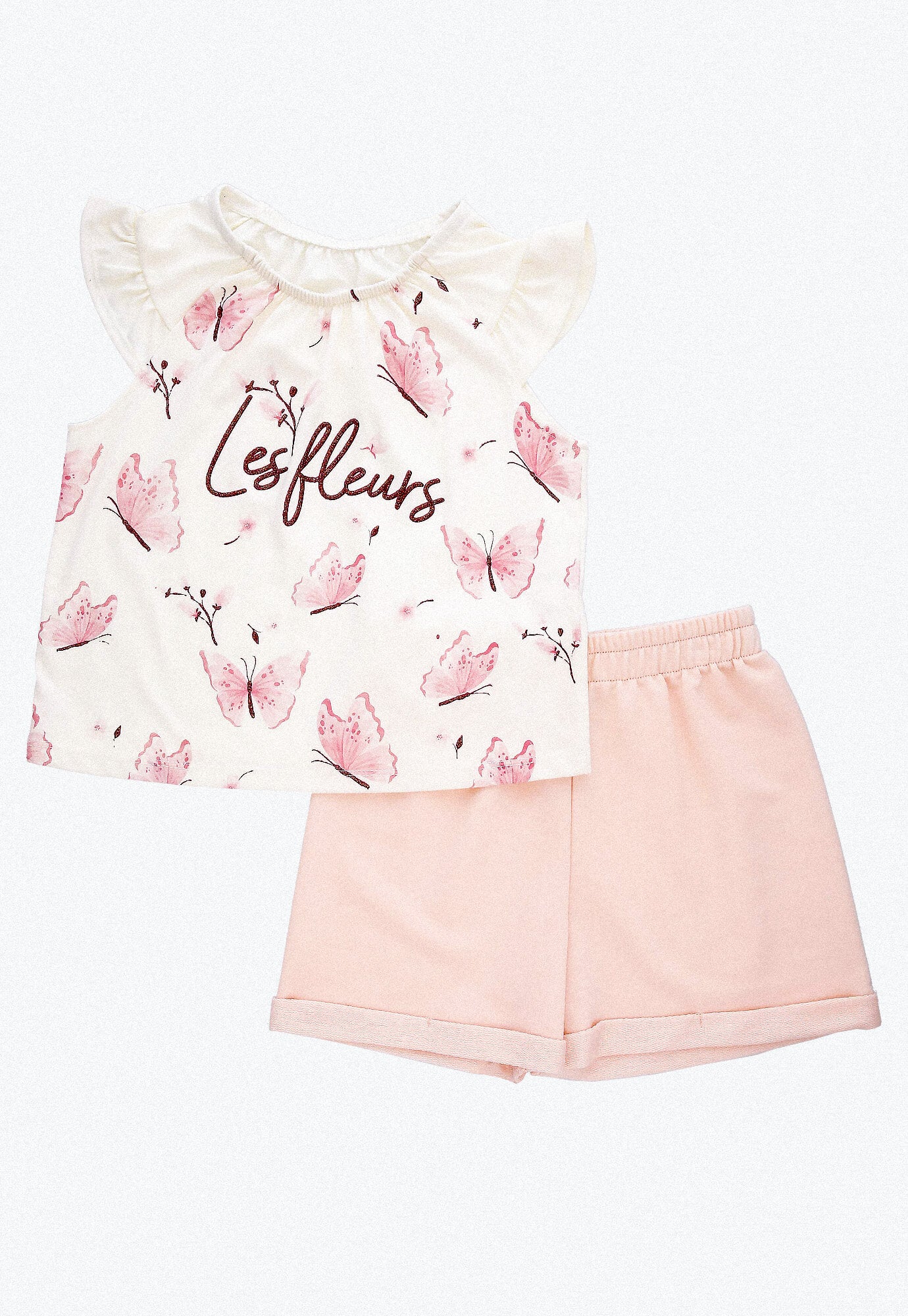 Conjunto corto, camiseta ivory en rib, sublimada y short rosa con cintura elástica para bebé niña