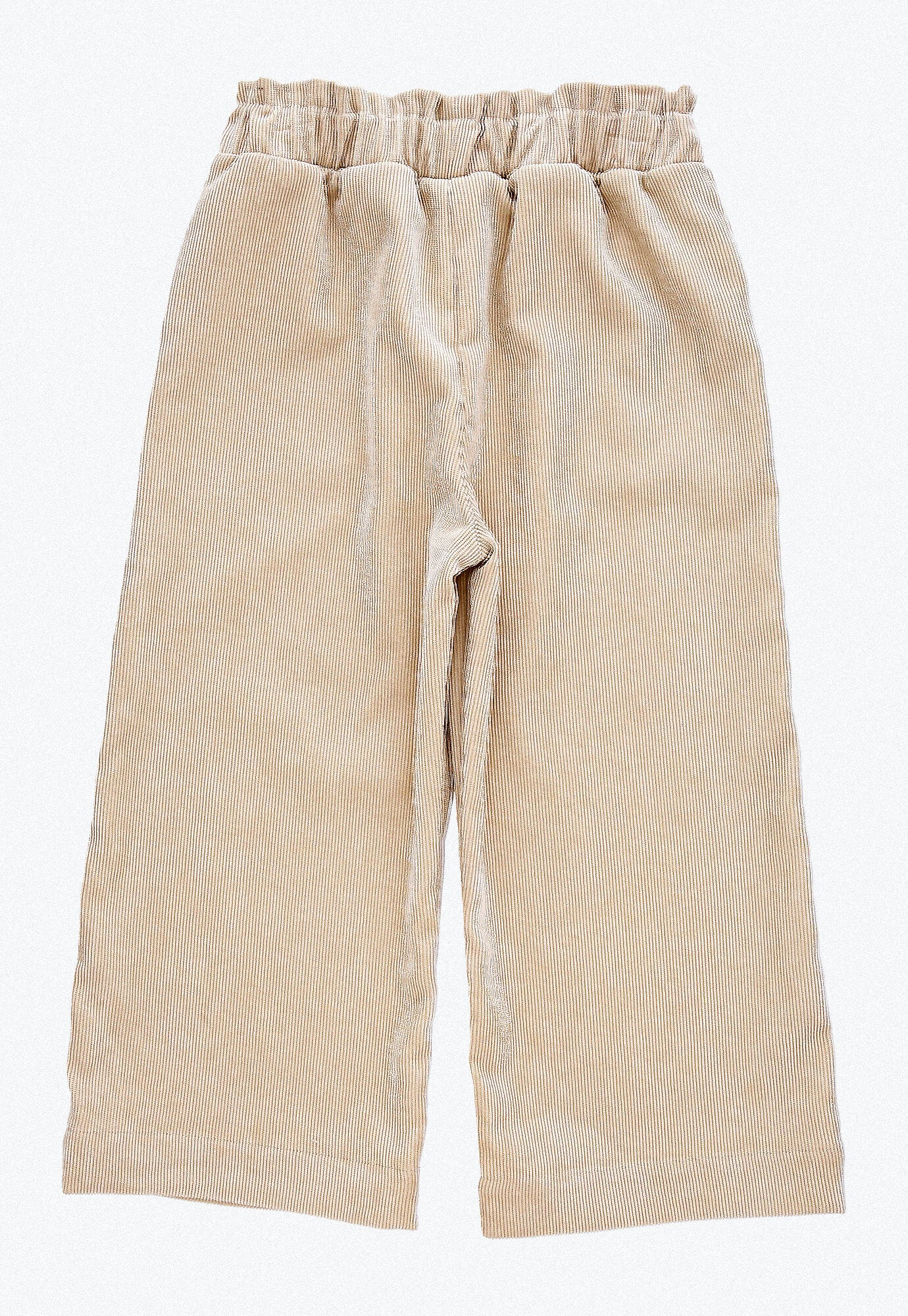 Pantalón largo arena con bolsillos frontales y cintura elástica para bebé niña