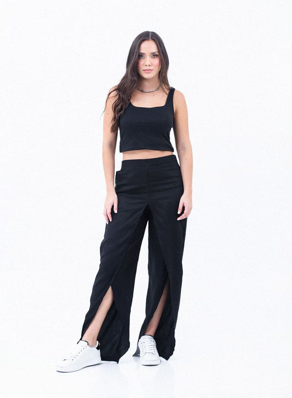 Pantalón amplio negro con aberturas en botas para mujer
