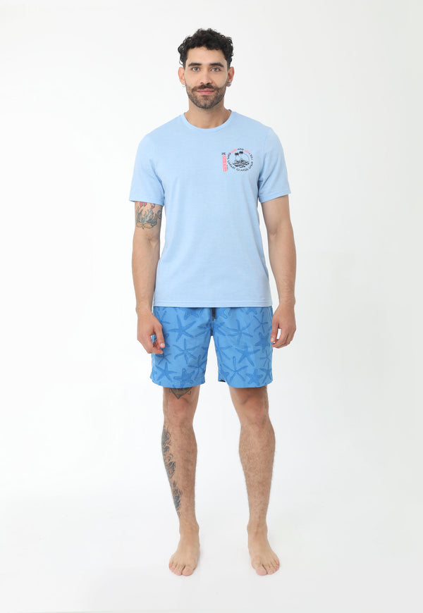 Pantaloneta de playa azul sublimada, elástico en cintura, cordón ajustable y suspensorio interno en malla para hombre
