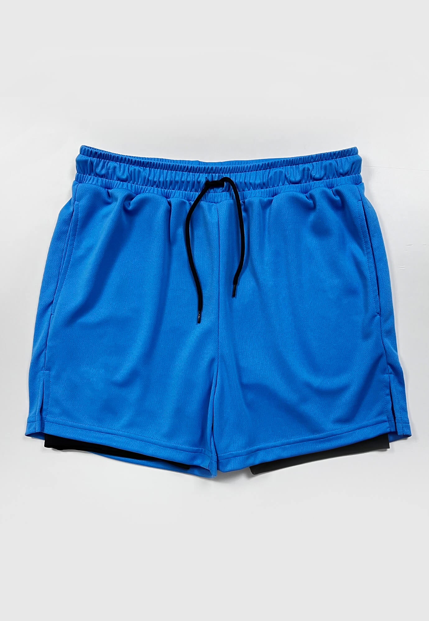 Short deportivo azul neon fondo entero, ciclista interno, cordón ajustable y bolsillos laterales para hombre