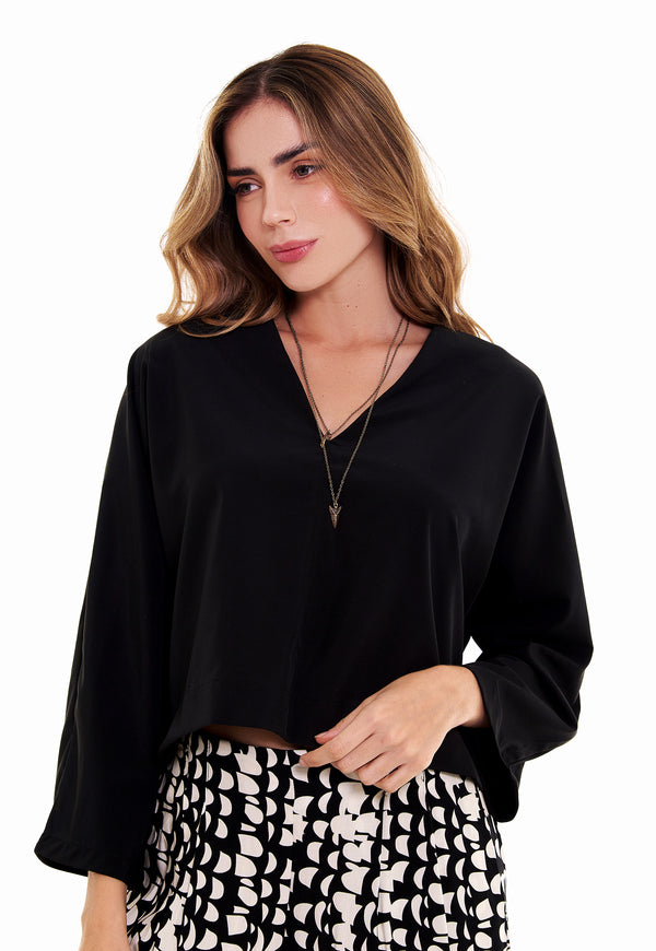 Blusa manga larga con escote en V