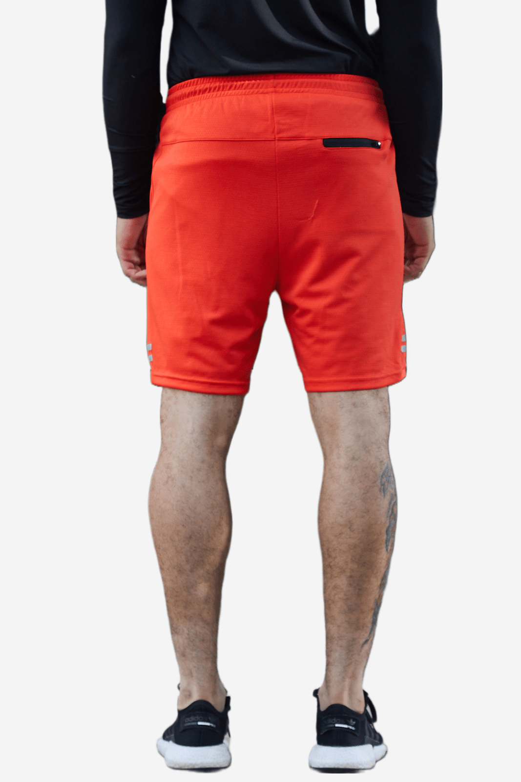 Pantaloneta deportiva naranja fondo entero, bolsillos laterales y bolsillo en posterior con cierre para hombre